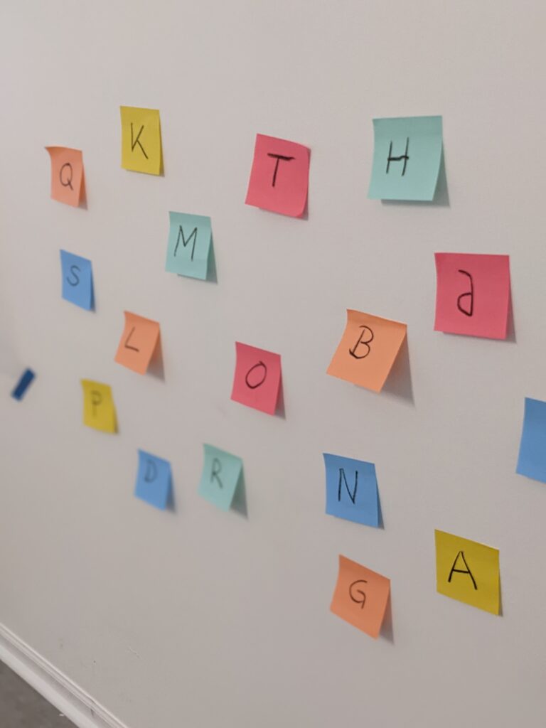 Letters on post-its to match up on poster
