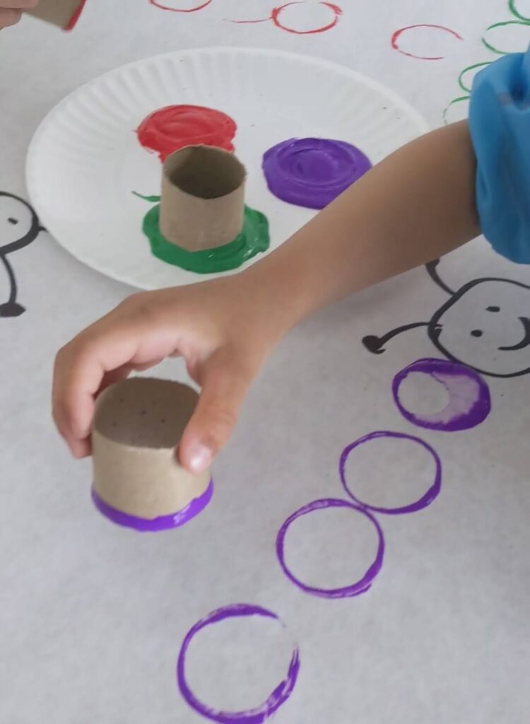 Caterpillar stamp with toilet paper roll and paint